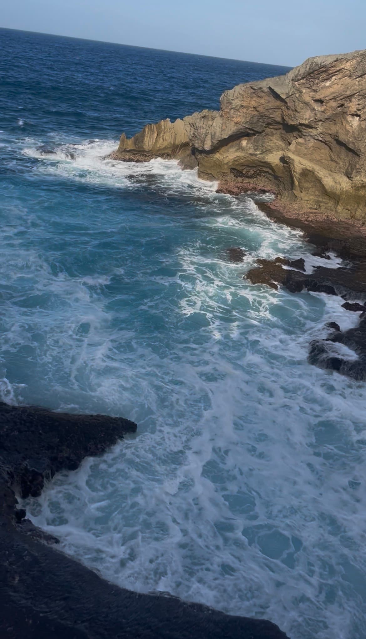 Cueva del Indio — sea cliffs and surf at Arecibo, Puerto Rico
